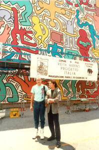 Piergiorgio Castellani Keith Harring in front of the mural in Pisa